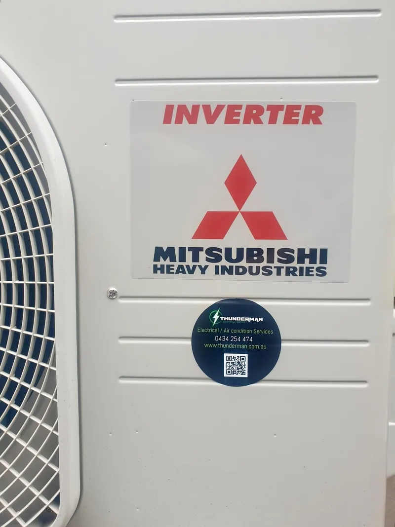 Mitsubishi Heavy Industries outdoor unit carrying a Thunderman service sticker