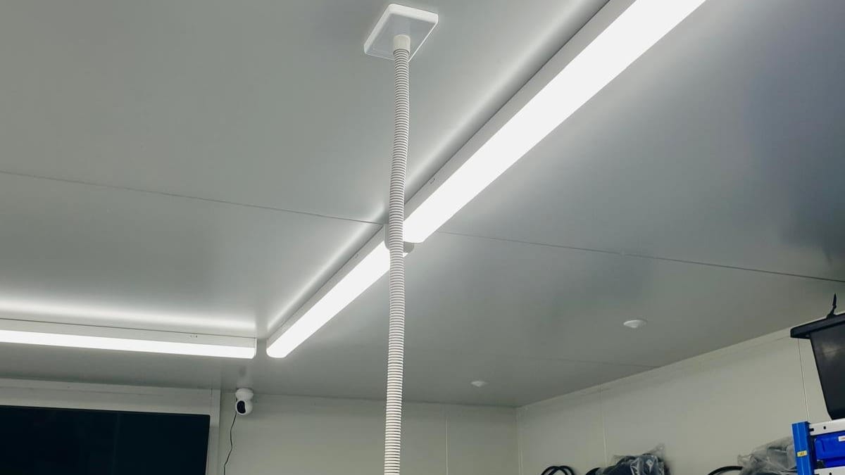 Workshop ceiling fitted with long LED batten lights